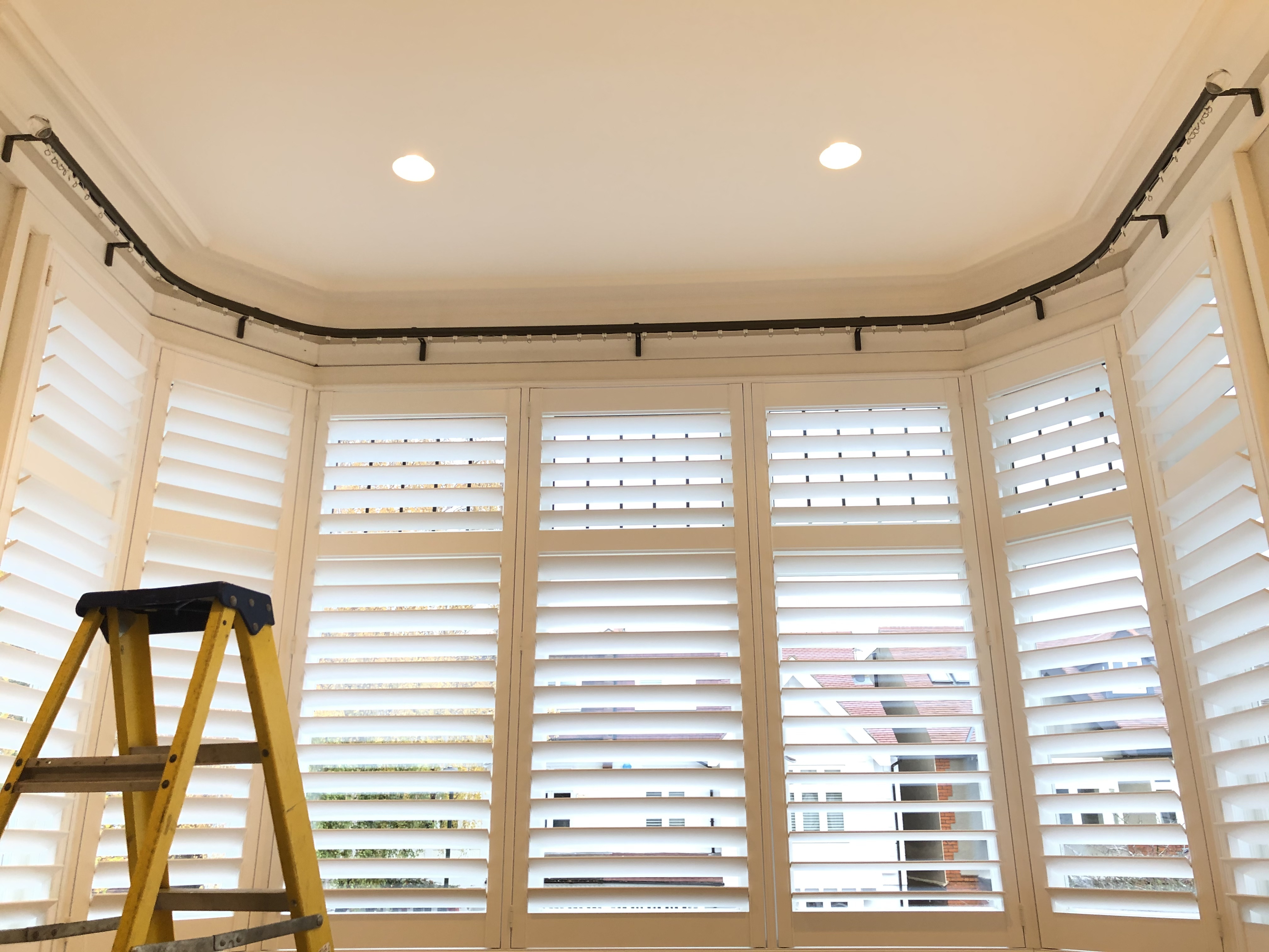Enhance Your Home with Perfectly Fitted Curtain Poles Custom curtain pole installed in a stylish room