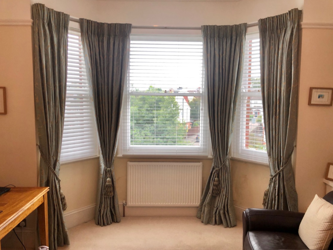 Elegant and Functional Venetian Blinds Venetian blinds with sleek aluminum slats